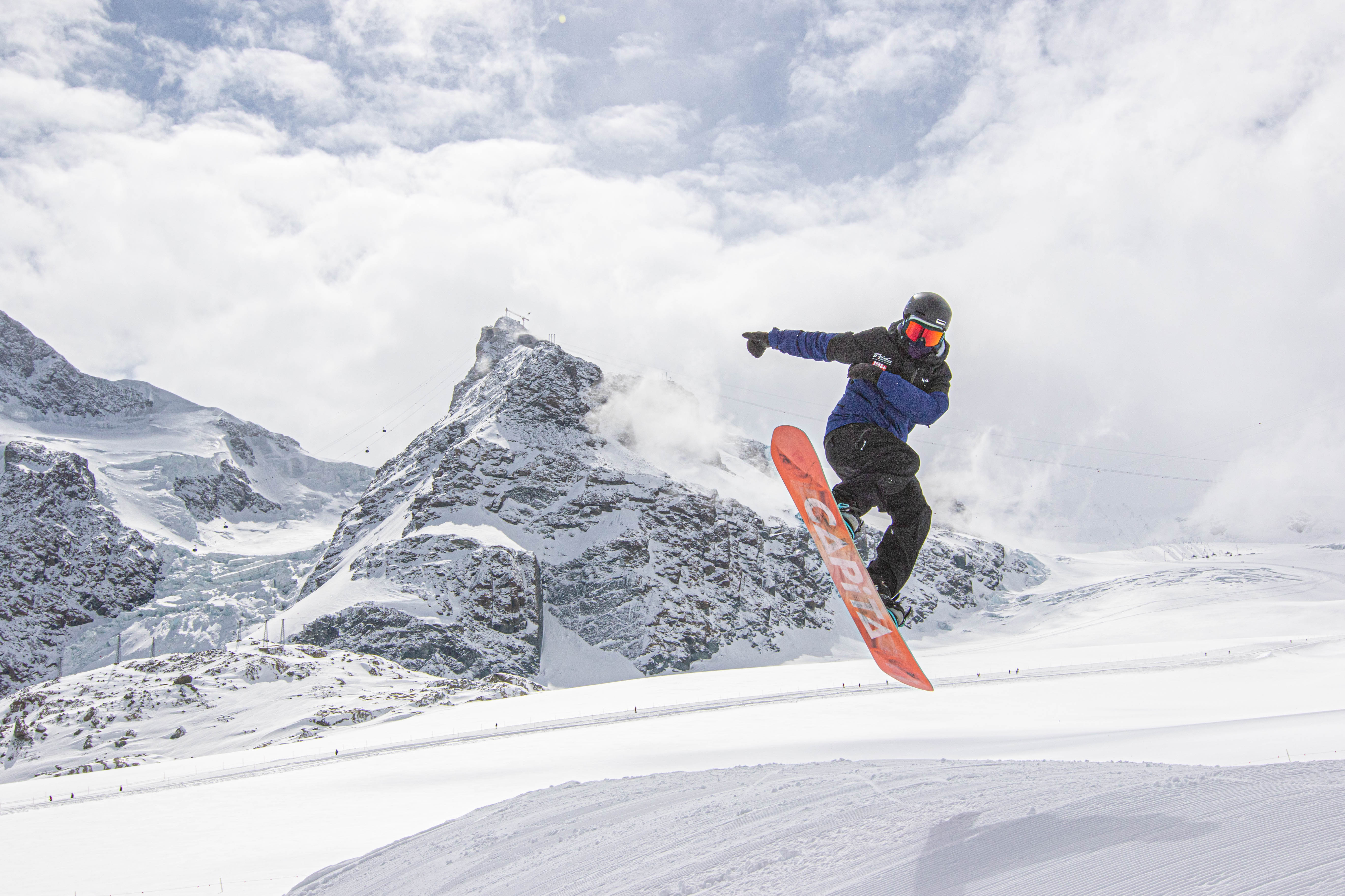kids snowboard lessons with an instructor in Zermatt
