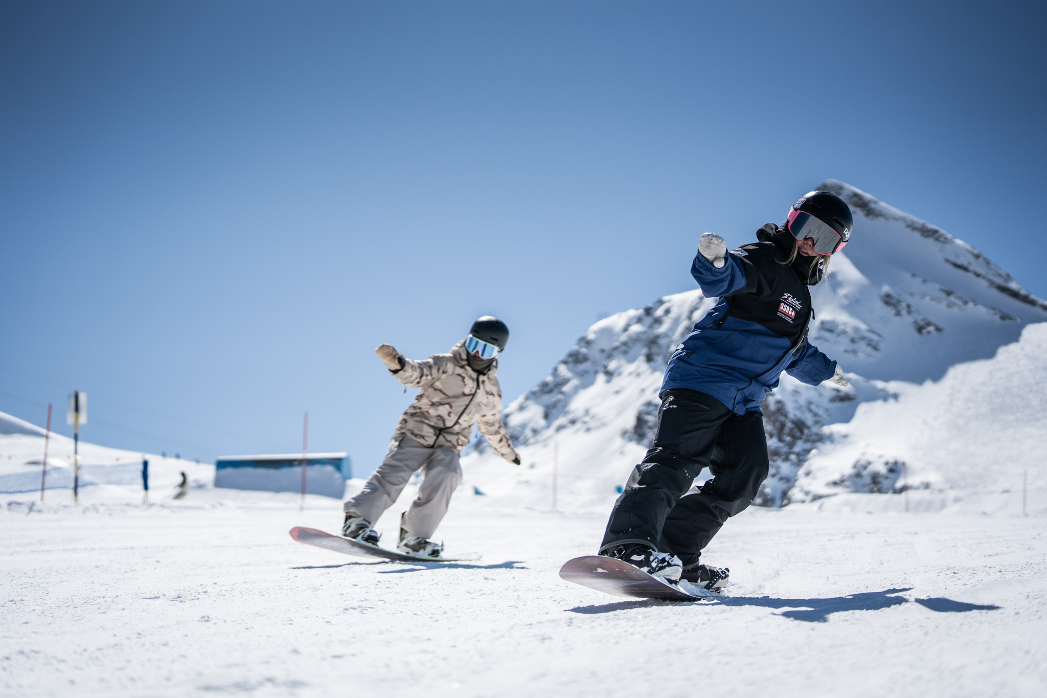 kids snowboard lessons with an instructor in Zermatt